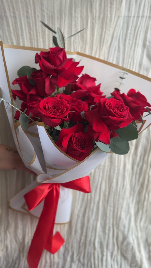 Modern & Reflexed Dozen Red Rose Hand tied Bouquet