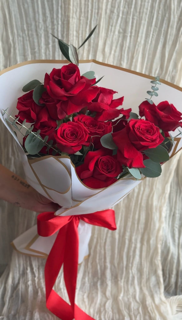 Modern & Reflexed Dozen Red Rose Hand tied Bouquet