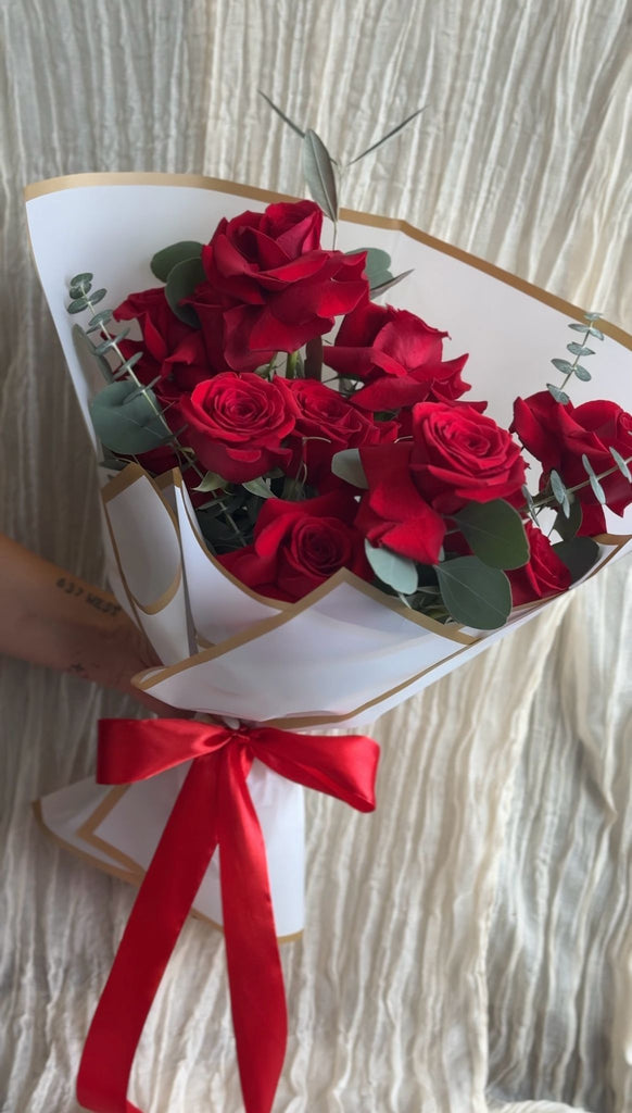 Modern & Reflexed Dozen Red Rose Hand tied Bouquet