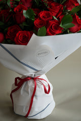 Two Dozen Red Roses Hand Tied